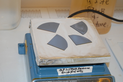 Bootcamp-pieces of silicon wafers being baked on a hotplate