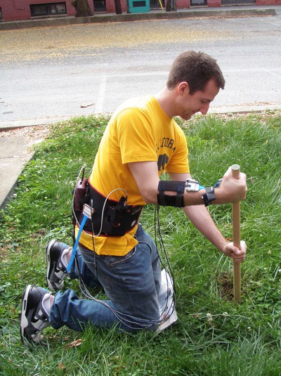 Andrew Zipkin’s research investigated hand pressures while using digging sticks, which early hominins may have used to access underground storage organs.  Here, Kevin Hatala demonstrates the use of a digging stick.