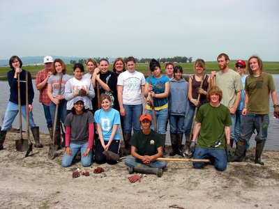 High school students restoring habitat